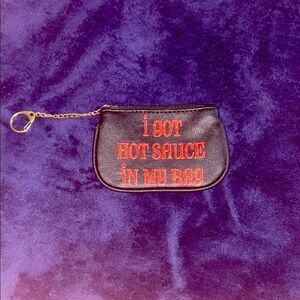Black Pouch with Red Text